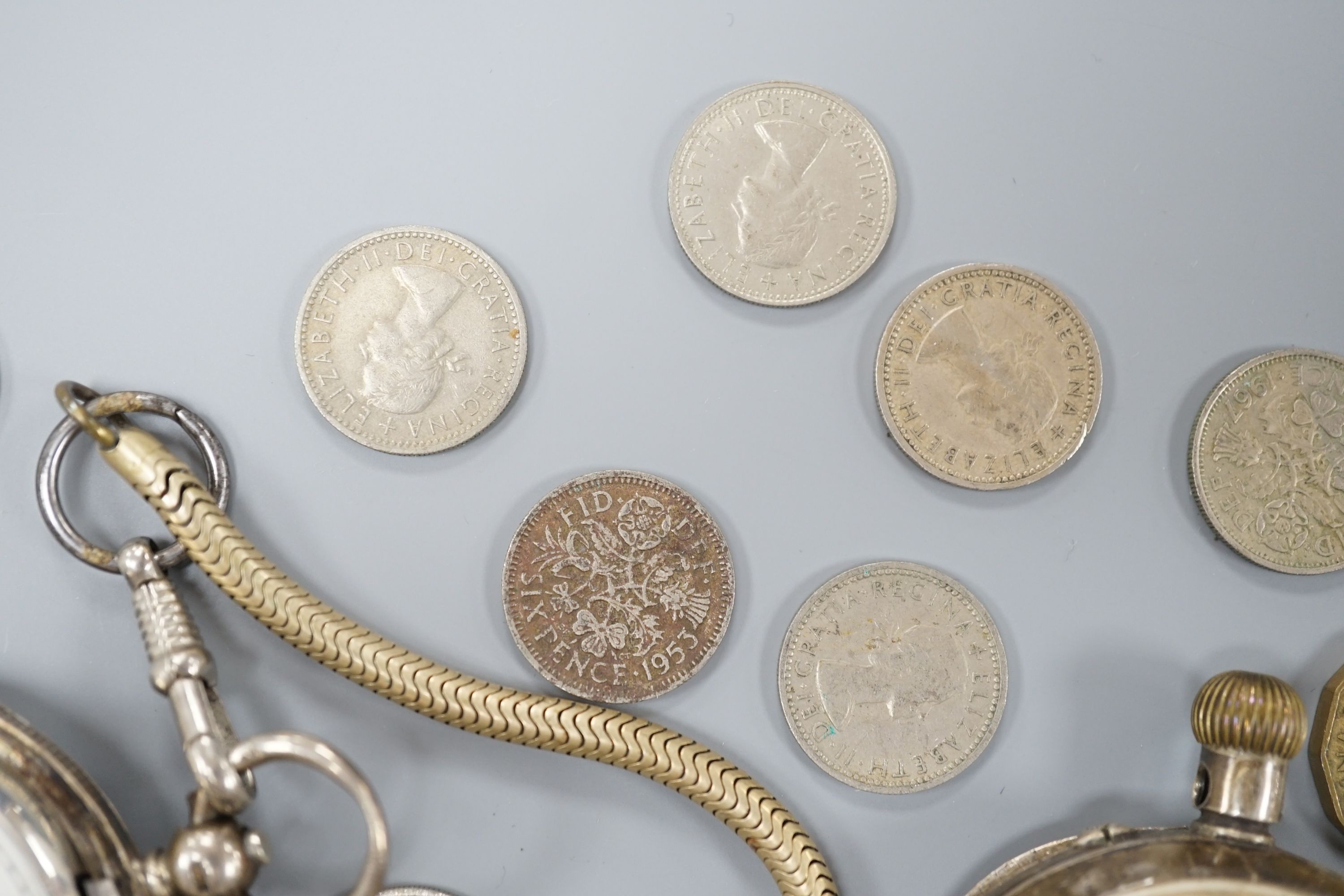 A late Victorian silver hunter keywind pocket watch, by Willcox of Grahams Town, one other white metal pocket watch, assorted minor coins and a sterling pen.